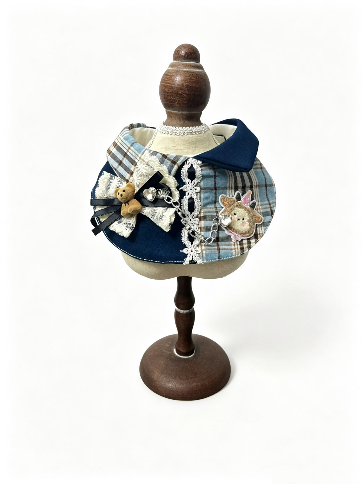 Navy and blue plaid bib with teddy bear and lace