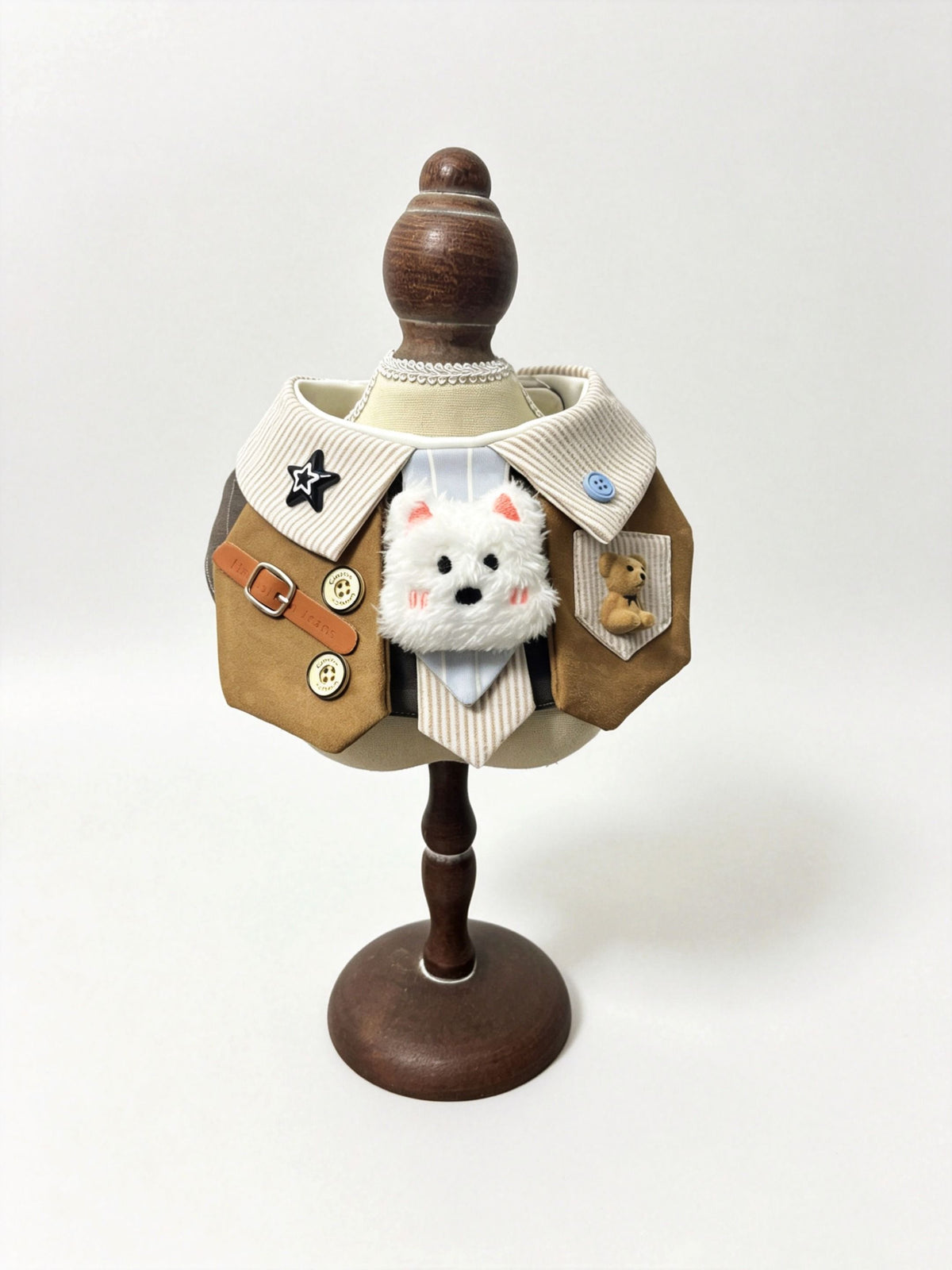 Brown vest bib with fluffy white puppy patch